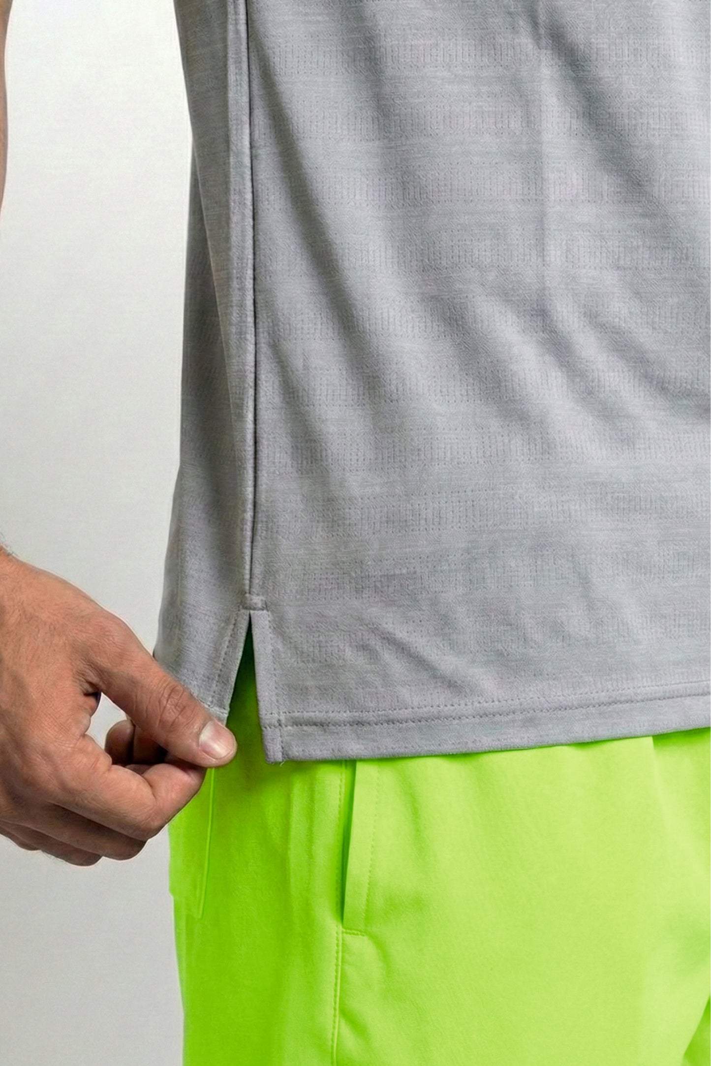 grey singlet with neon green stitch