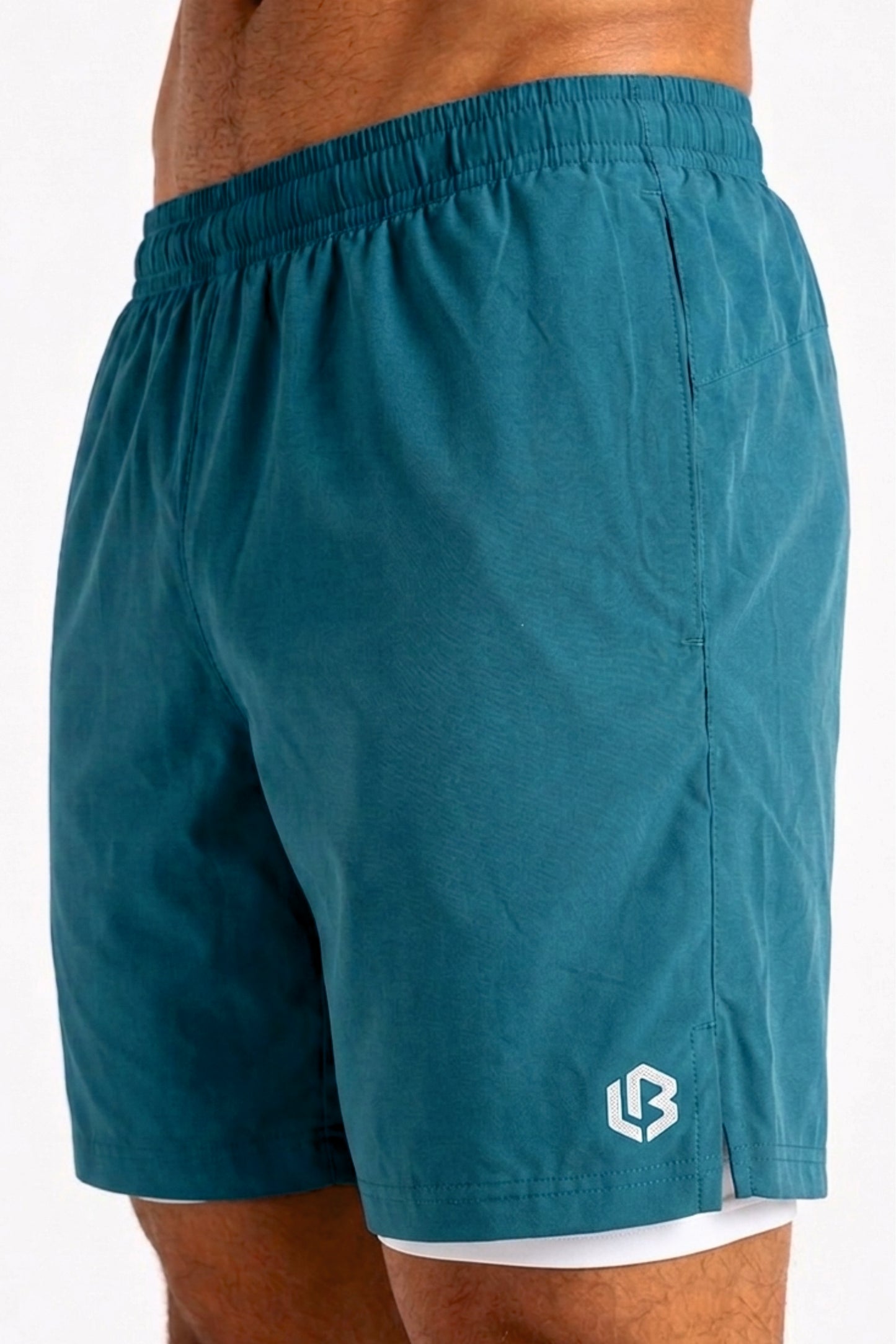 velocity 7" sea green shorts (with compression)