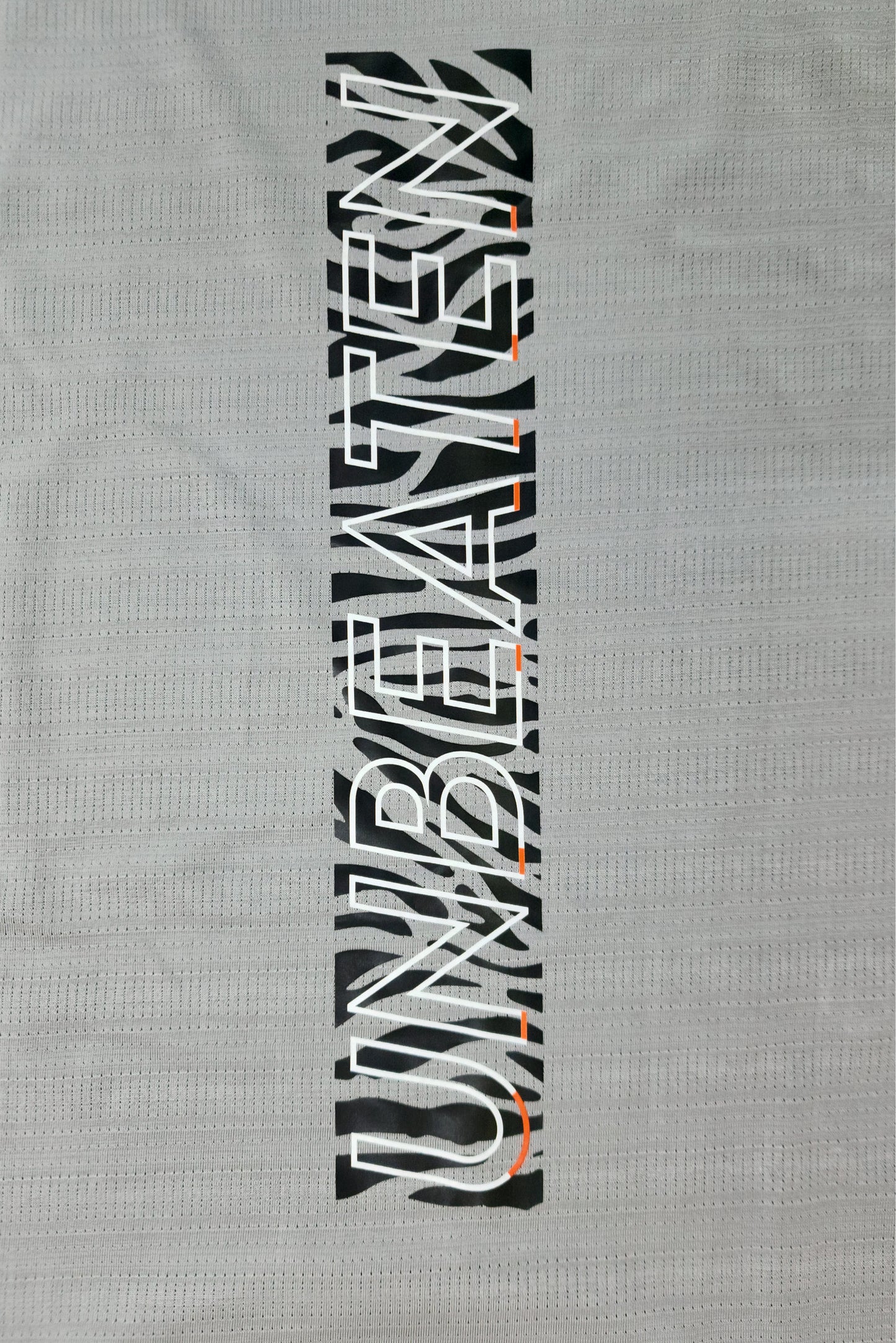 grey tshirt with unbeaten back